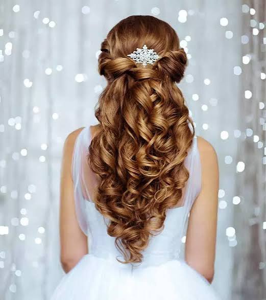 Goddess braids with beads and curly ends
